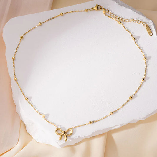 Liora – Infinite Charm Bow Pendant