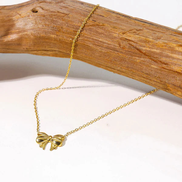 Bellaria – Golden Bow Whisper Pendant