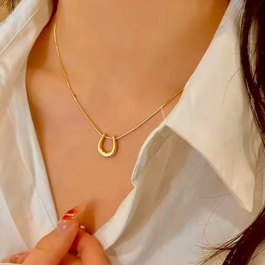 Oralyn β Modern Gold Loop Pendant