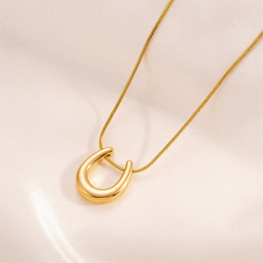 Oralyn β Modern Gold Loop Pendant