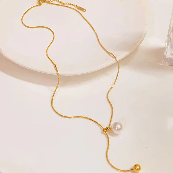Liora – Pearl Drop Twist Pendant Necklace