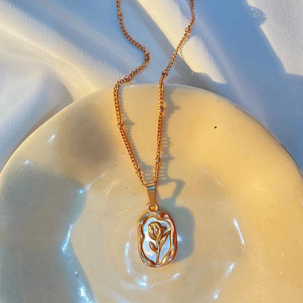 Rosmira – Gilded Petal Cameo Pendant