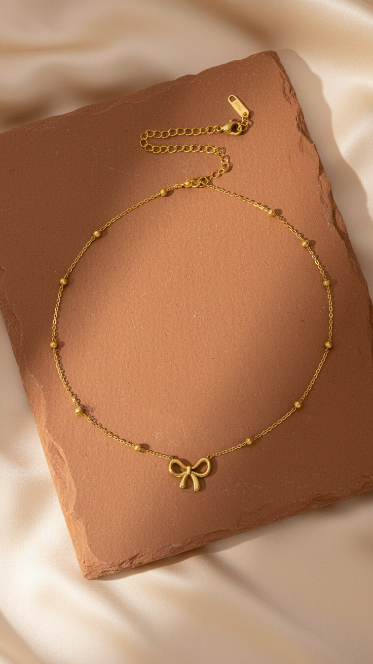 Liora – Infinite Charm Bow Pendant
